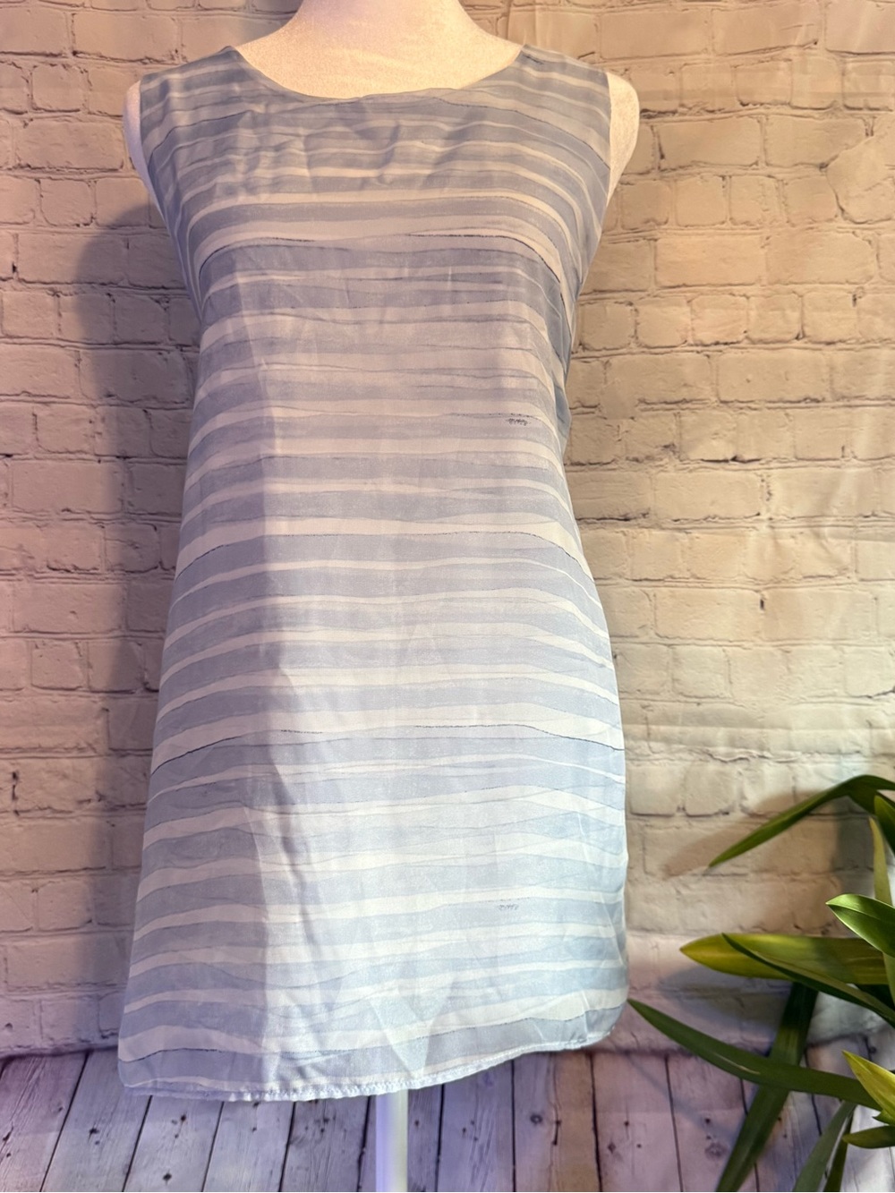 Sleeveless Light Blue and White Striped Sleeveless Shirt